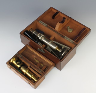 A students  brass single pillar microscope with mahogany case together with a chrome single pillar microscope and Leitz lens cased
