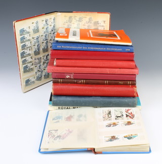 Three albums of world stamps, a 1998 album of German stamps, an exercise book of Colombian stamps, 7 stock books of world stamps and a 1988 souvenir collection of Canadian stamps 