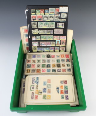 A collection of George VI and later mint and used Commonwealth stamps including St Helena, Cayman Islands, St Lucia and loose leaf world stamps - China  