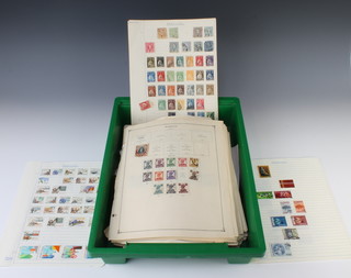 A loose leaf album of 1930's/40's mint and used world stamps including Belgium, Gibraltar, Finland, Cameroon, etc  