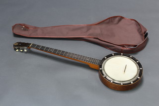 A Dulcetta 5 string Zither banjo with fabric carrying case 