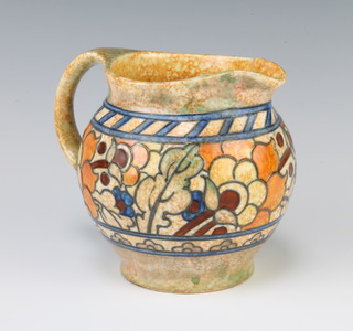 A Charlotte Rhead Crown Ducal jug the tan ground with stylised flowers and leaves 13cm 