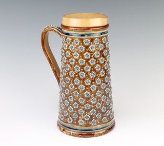 A  Doulton Lambeth tapered jug with stylised floral motifs and beadwork handle 26cm 