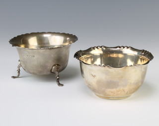 A silver sugar bowl on pad feet Birmingham 1938 and a bowl with wavy rim Sheffield 1902, 176 grams 