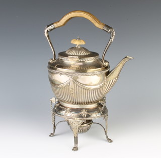 A Victorian silver tea kettle on stand with burner, having repousse swag decoration and fruitwood mounts, Sheffield 1895, 1024 grams 