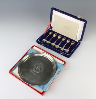 A set of 6 Nepalese silver coffee spoons with Kukri decoration 48 grams, cased, together with a Cartier pewter dish inscribed seal of the President of the United States with facsimilar signature Ronald Reagan 