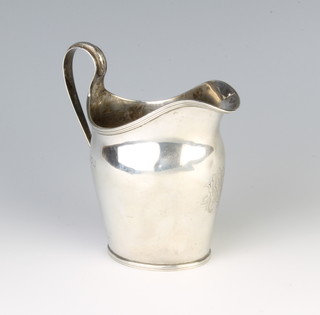 An Edwardian silver cream  jug of plain form, London 1904, 108 grams