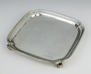 A square silver card tray with scroll feet Sheffield 1954, 229 grams 15.5cm 