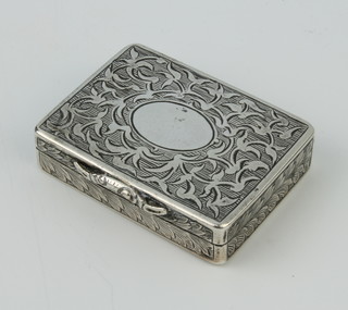 A Victorian silver rectangular vinaigrette with chased scrolls, vacant cartouche and floral grill, Birmingham 1857, 4.5cm x 3.5cm 