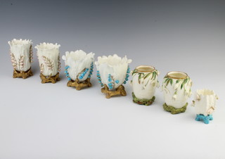 Three pairs of Moore porcelain floral vases 10cm, 11cm and 12cm, a single do. 7cm 