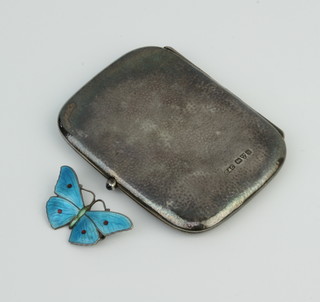 An Edwardian silver hammer pattern cigarette case with hardstone cabochon button, Chester 1902 together with a silver and enamelled butterfly brooch 74 grams  