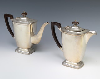A silver plated teapot and coffee pot with fruitwood mounts 
