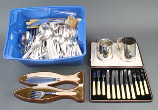 A pair of silver plated fish servers in a fish shaped fitted case, a quantity of plated items 
