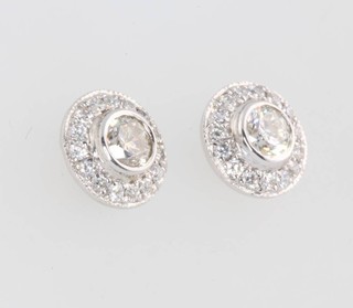 A pair of 18ct white gold diamond ear studs, approx. 0.52ct