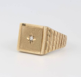 A gentleman's 9ct yellow gold diamond set signet ring 5.9 grams, size R 