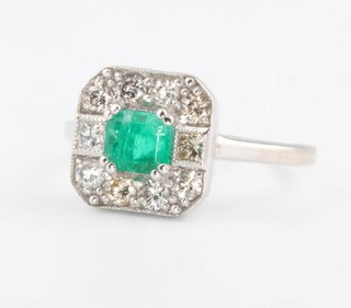 An 18ct white gold Art Deco style emerald and diamond ring size N 