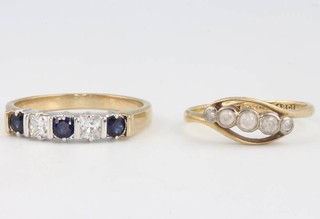 An 18ct yellow gold gem set ring size M 1/2 and a yellow gold sapphire and diamond ring size Q 1/2 