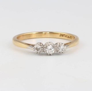 An 18ct yellow gold 3 stone diamond ring size L 