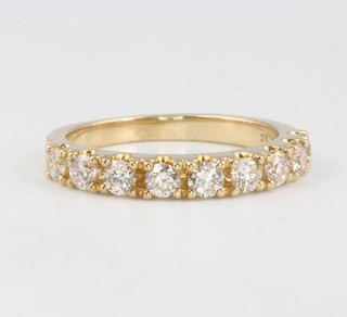 A 9ct yellow gold diamond half eternity ring approx. 0.75ct size L 