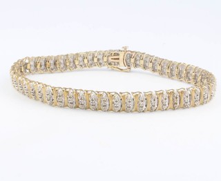 A 9ct yellow gold diamond set bracelet 18.5cm 