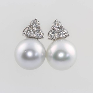 A pair of 18ct white gold grey cultured pearl and triple diamond ear studs, diamonds approx. 1.44ct, pearls 14mm 