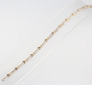 A 9ct yellow gold diamond set bracelet 8.1 grams, 18cm 