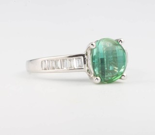 An 18ct white gold oval cut tourmaline and diamond ring size O 