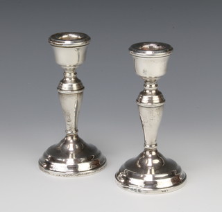 A pair of silver dwarf candlesticks of tapered form Birmingham 1959, 14cm 