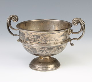 A silver 2 handled trophy cup, rubbed hallmarks 181 grams, 10cm 