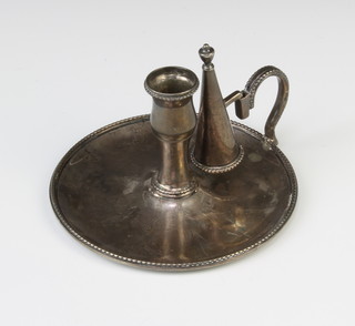 A George IV silver chamberstick of simple form with chased monogram London 1820, 115 grams, 10cm 