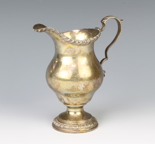 A silver baluster cream jug London 1965, 264 grams, 18cm 
