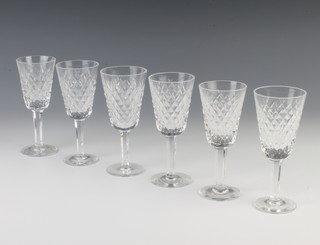 A set of 6 Waterford Crystal sherry glasses with hobnail decoration 