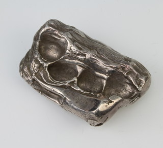 A silver paperweight in the form of a fist imprint, 675 grams, 9cm 