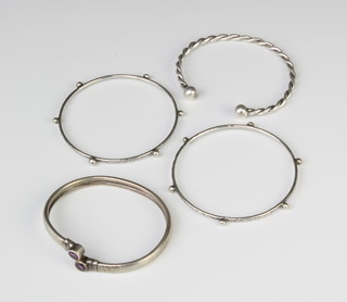 Three silver bangles, 46 grams