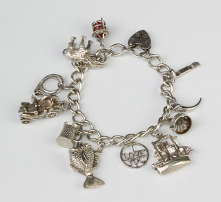 A silver charm bracelet, 46 grams 