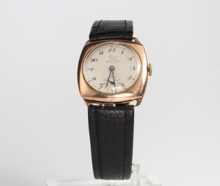 A gentleman's 9ct yellow gold Record wristwatch with seconds at 6 o'clock on a leather strap 6.8 grams