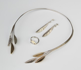 A silver necklace, a do. ring and earrings with gold terminals, 37 grams