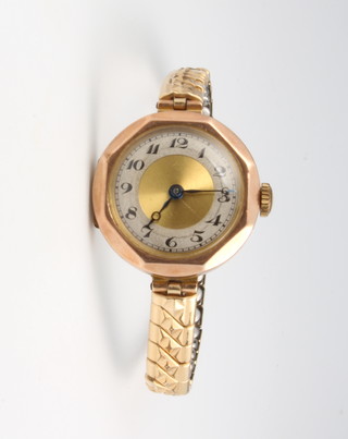 A lady's 9ct yellow gold octagonal wristwatch on a gilt expanding bracelet 