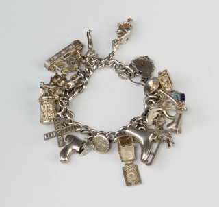 A silver charm bracelet, 78 grams 