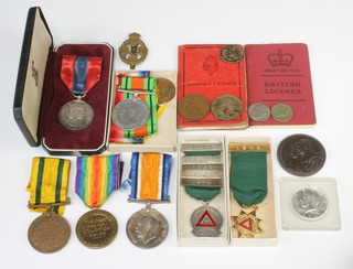 A group of medals of 126962 SPR .R.T.Anderson.R.E. comprising British War medal, Victory medal, Territorial War medal and Imperial Service medal with posting box and minor medals and coins 
