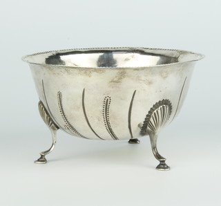 A George 111 silver bowl of plain form with shell leaves and hoof feet, Dublin 1809, 162 grams, 14cm 