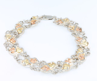 A Black Hills Gold, silver  bracelet set with gold leaves 18.5cm 