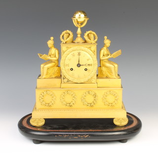 A 19th Century French 8 day striking mantel clock contained in a gilt metal case with figures depicting education, striking on a bell and complete with glass dome (no pendulum)