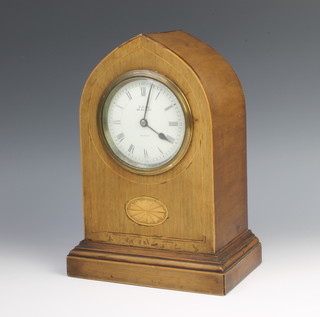 An Edwardian French mantel timepiece with enamelled dial and Roman numerals contained in an inlaid mahogany lancet case, the dial marked C R Loe, 46 Curzon Street, Mayfair 
