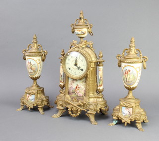 A German 8 day striking gilt metal and enamel cased mantel clock together with 2 matching side urns  