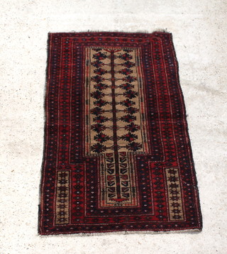 A brown and red ground Afghan prayer rug 139cm x 88cm 
