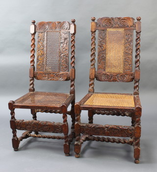 A near pair of 17th/18th Century carved oak high back chairs with carved cresting rails, cane seats and backs, raised on turned supports  
