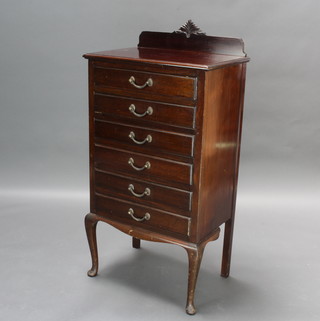 An Edwardian rectangular mahogany sheet music chest of 6 long drawers with carved raised back, raised on cabriole supports 107cm h x  53cm w x 36cm d 