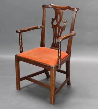 A Georgian oak and mahogany Chippendale style carver chair with vase shaped slat back and upholstered drop in seat, raised on square tapered supports with H framed stretcher 