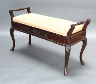An Edwardian rectangular mahogany duet stool with carved apron and upholstered lid raised on cabriole supports 57cm h x 99cm w x 41cm d  